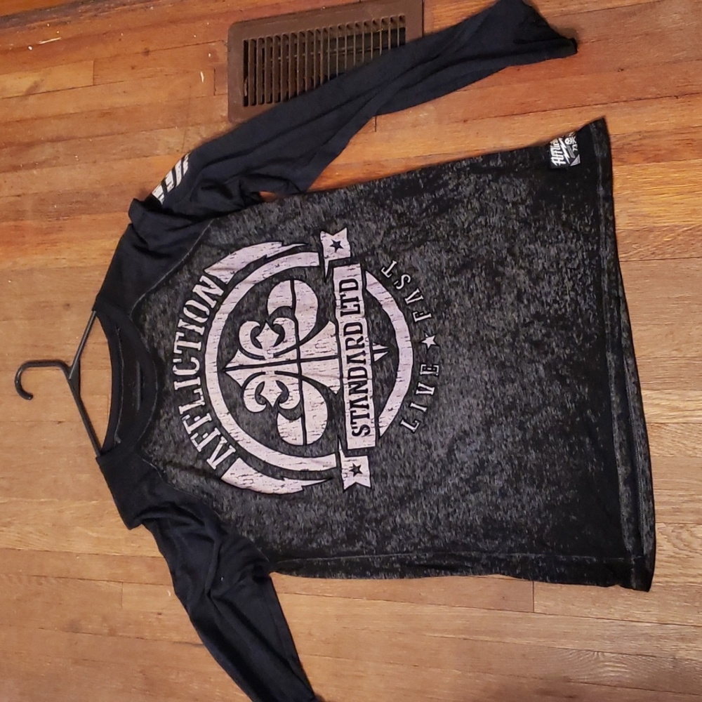 Size large affliction top
